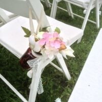 Bruiloft versiering stoelen